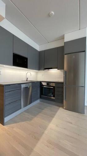 Modern family apartment next to metro easy access to Helsinki