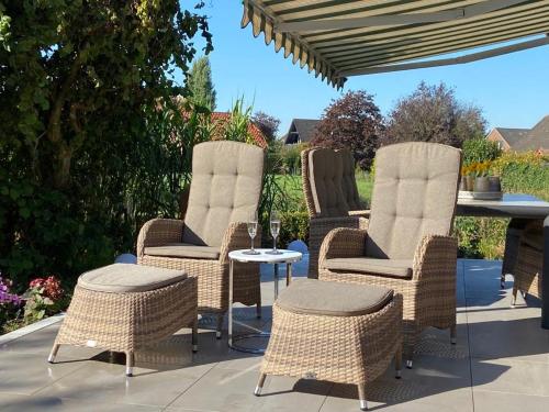 شرفة/ تراس, Ferienhaus FRIESENHERZ - Traum-Landhaus mit Sauna & Wallbox in Krummhorn