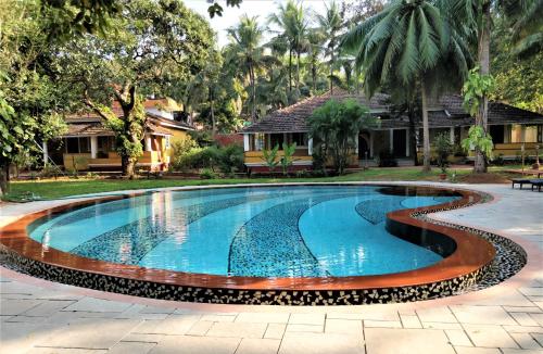 Zwembad, Granpas Inn - Hotel Bougainvillea in Goa