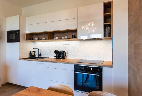 ห้องครัว, Apartmán Svět Relaxu (Apartman Svet Relaxu) in เทรบอน