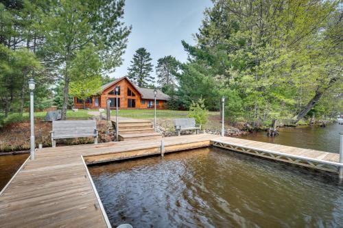Lakefront Eagle River Vacation Rental with Boat Dock