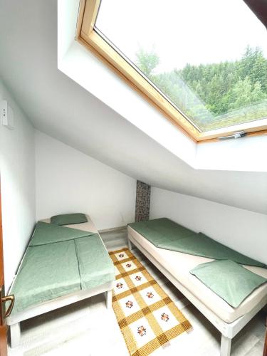 . Gyimesi kulcsosház / Casa de vacanta Ghimes