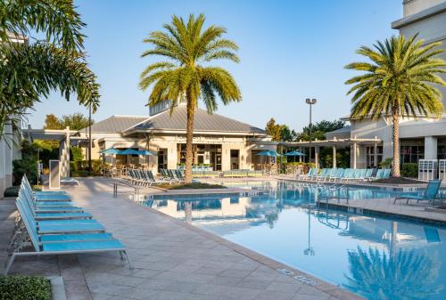 Swimming pool, TownePlace Suites by Marriott Orlando at FLAMINGO CROSSINGS® Town Center/Western Entrance near Be Our Guest