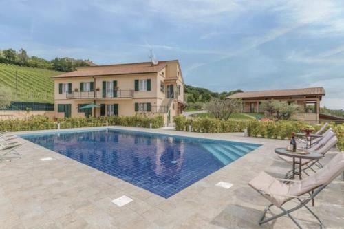 Beautiful holiday home in Montedinove with shared pool