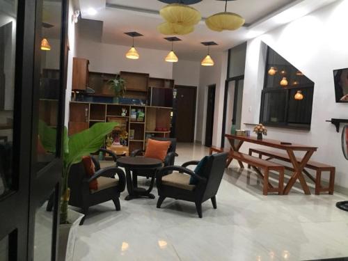 5 Coconut Homestay Hoi An - Tap to explore photos