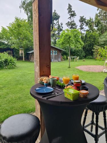 Ecolodge prive sauna, prachtige tuin, jacuzzi en warm zwembad