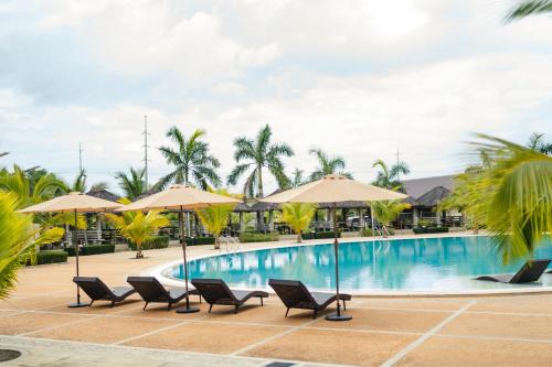 Swimming pool, River Palm Hotel and Resort powered by Cocotel in Bugallon