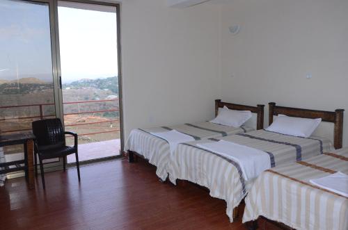 Triple Room with Mountain View room in Zan-Seyoum Hotel - Lalibela