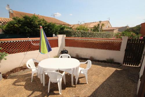 Maison T2 cabine 4 couchages, terrasse cloturée, résidence Sun village avec piscine commune, 300m de la plage à PORTIRAGNES PLAGE LRSUNR6 - Location, gîte - Portiragnes