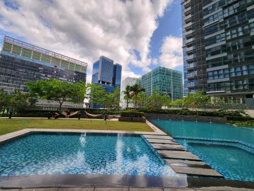 20F Modern Cozy BGC Suite across 2 Major Malls with Washer FREE Parking, Manila (fotografie 5)
