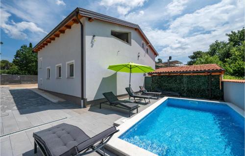 Amazing Home In Peroj With Outdoor Swimming Pool, Wifi And 5 Bedrooms