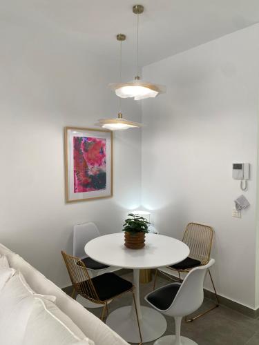 El Anfitrión - Estudio Argüeso