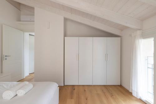 Olmo Suites - Tap to explore photos