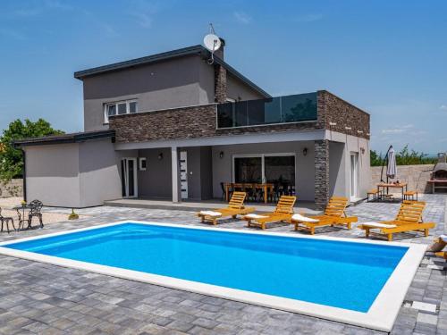 Modern villa with private pool, terrace and fenced garden
