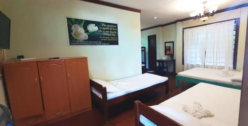 Pinaluyan Guest House