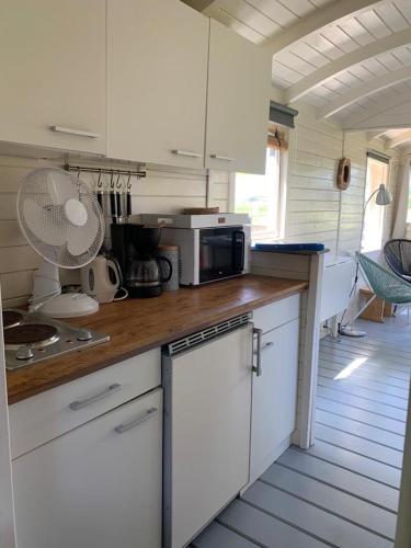  Pipowagen Madelief UNIEK natuurbad met strand exclusief voor onze gasten in Netterden