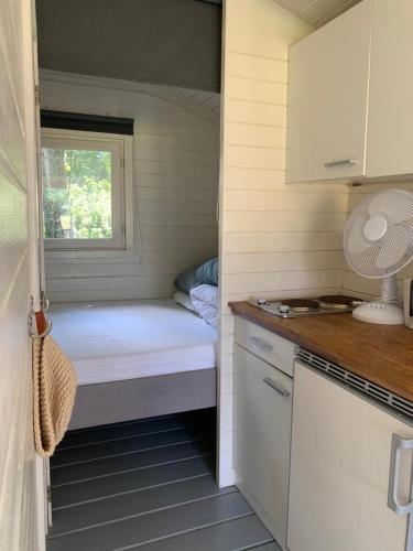  Pipowagen Madelief UNIEK natuurbad met strand exclusief voor onze gasten in Netterden