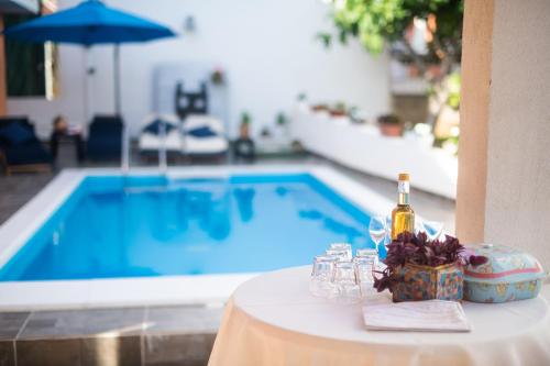 Apartments and Room Agiss with pool