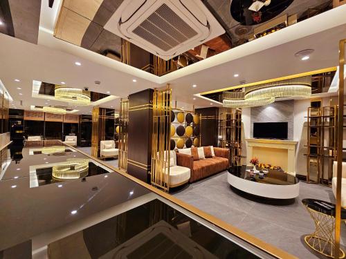 gedeelde lounge/tv-ruimte, Asur Imperıal Hotel in Midyat