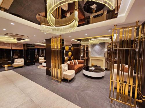 gedeelde lounge/tv-ruimte, Asur Imperıal Hotel in Midyat