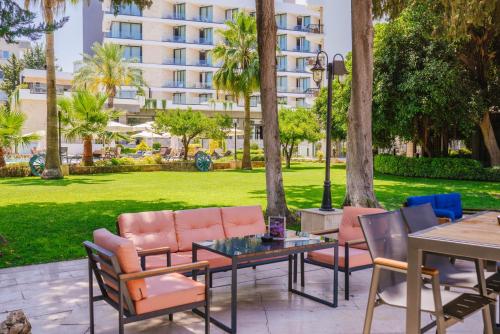 花园, 皮娅贝拉酒店 (Pia Bella Hotel) in 金瑞目