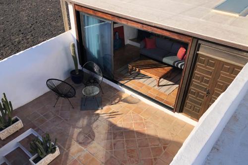 Fasiliti, Casa Lupe. Art-inspired courtyard house in Teguise in Teguise