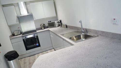 Kitchen, Cocoon @ International Inn near Williamson Tunnels - Friends of Williamson's Tunnels