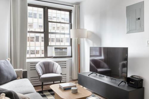 Midtown East 1br w media room nr Grand Central NYC-1169 in New York, USA