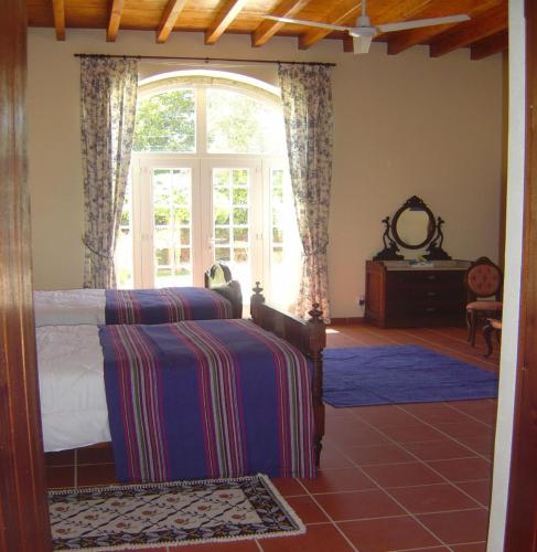 Two-Bedroom Suite with Pool View room in Quinta Do Scoto