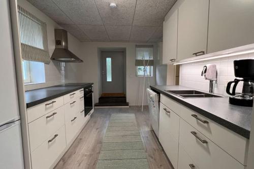 Létesítmények, Tunnelmallinen puutalohuoneisto. in Itaharju