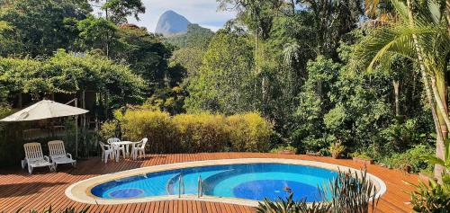 Casakor Cuiabá Itaipava, Linda, 4 quartos, piscina, muito verde e quadra de tênis em condomínio fechado