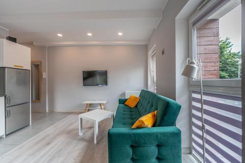 Emerald Apartament przy deptaku in 施扎夫諾茲德魯伊