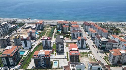 ALANYA KESTEL KİRALIK DAİRE EŞYALI HAVUZLU DENİZE YAKIN