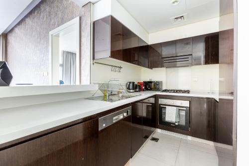 Nasma Luxury Stays - Deluxe Apartment In The Heart of Business Bay, Дубай (фото 10)
