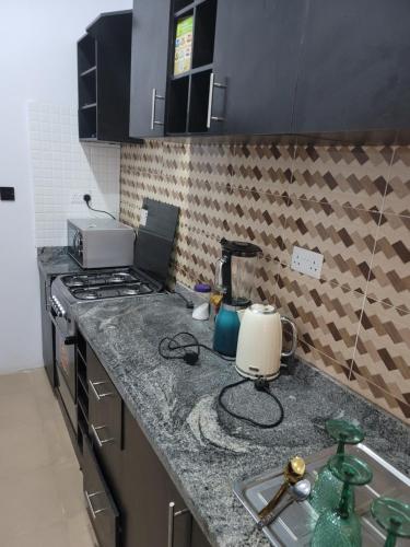 Treasure Park & Garden, Golf Estate. Simawa in Самагу