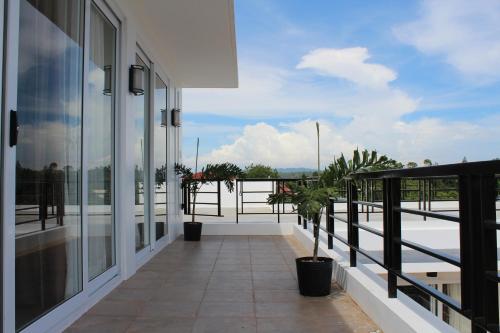 Balcony/terrace, Be-ing Suites Davao in Lanang