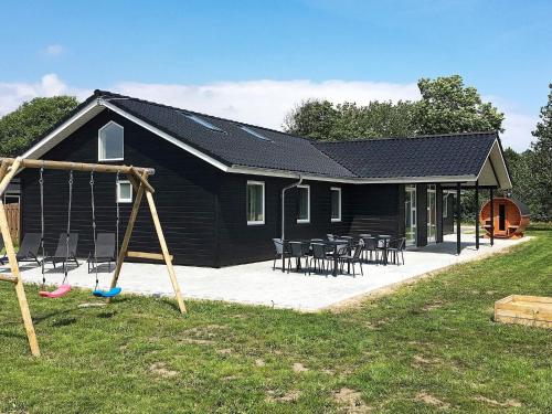 16 person holiday home in R m