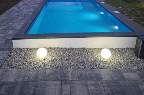 Air-conditioned holiday homes summer pool Rewal