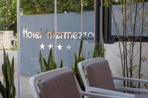 Hotel Intermezzo - Tap to explore photos