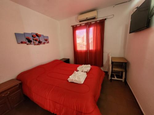 Hotel Belgrano in วิลลา คาร์ลอซ พาซ