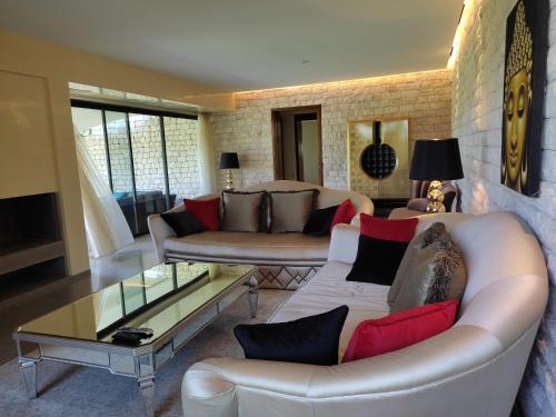 Koplietošanas atpūtas telpa ar TV, Villa Golf de Mogador - Piscine - Vue mer 180º in Diabat