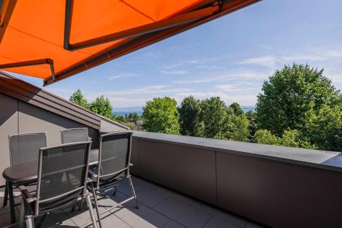 Erkély/terasz, Ferienwohnpark Immenstaad am Bodensee Maisonette-Wohnung 49 43 in Immenstaad am Bodensee