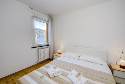 MGH - Malcesine Holiday Apartment, Мальчезине (фото 7)