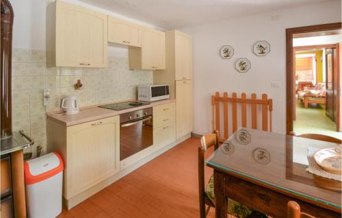 Nice Home In Lusiana With Kitchen