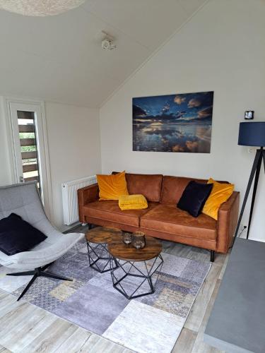 Ferienhaus Holland Beachhouse, modern eingerichtet, in schöner Lage am Veluwemeer, inklusive Garten, Terrasse am Wasser, Parkplatz und WLAN