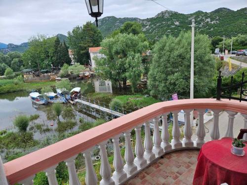 Apartments FLORA and boat cruising in Virpazar