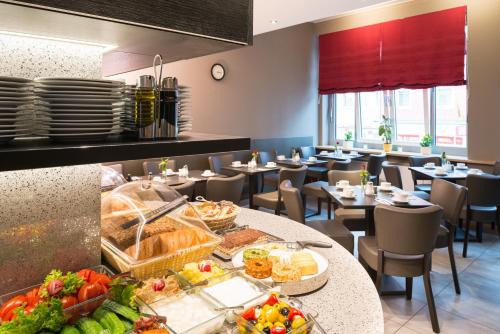 Restaurant, Hotel Munich Inn - Design Hotel in Munich