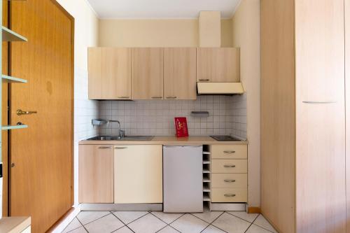 Bright Studio With Balcony by Wonderful Italy - Tap to explore photos