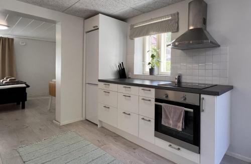 Konyha, Tunnelmallinen puutalohuoneisto. in Itaharju