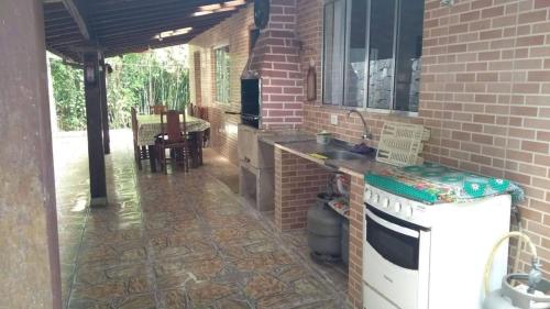 Ilhabela Casa Familia Feliz in Praia da Armacao